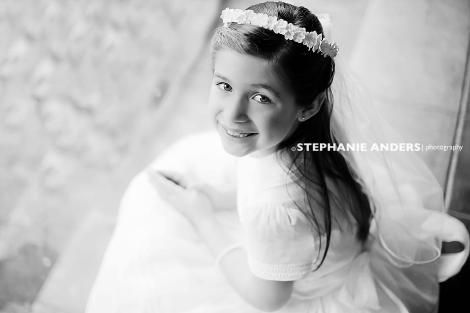 black and white first communion photo girl smiling