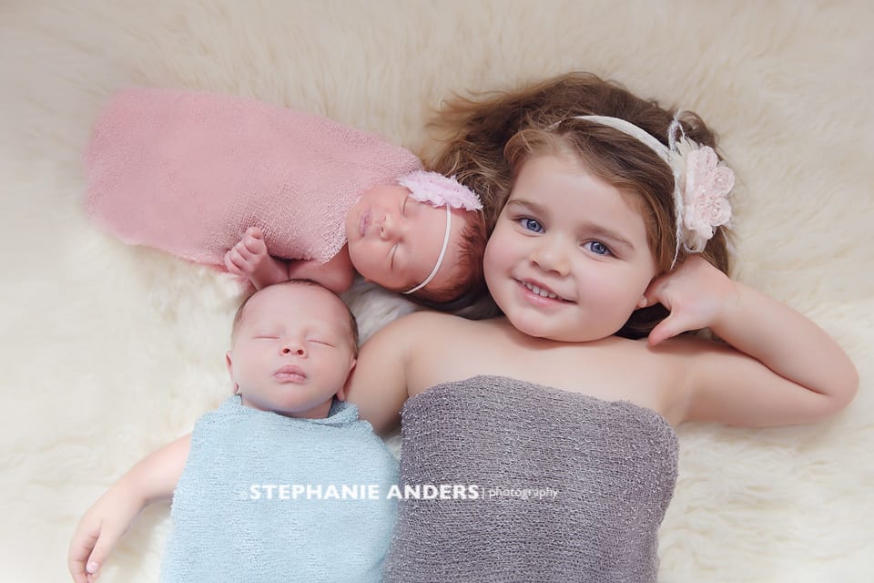 newborn twins with big sister