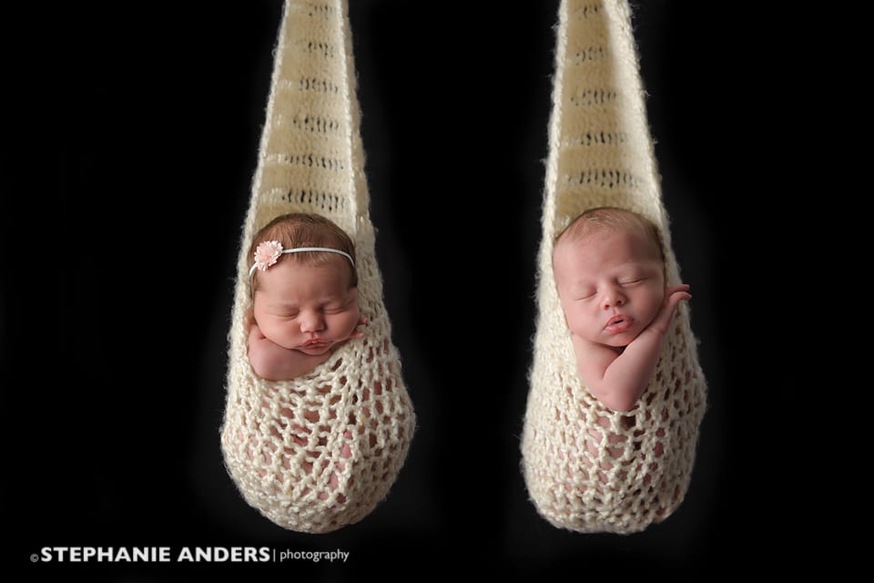 newborn twins in haning knitted hammock