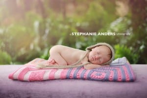 baby photo sleeping on pink blanket