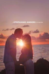 pregnancy photo couple kissing sunrise