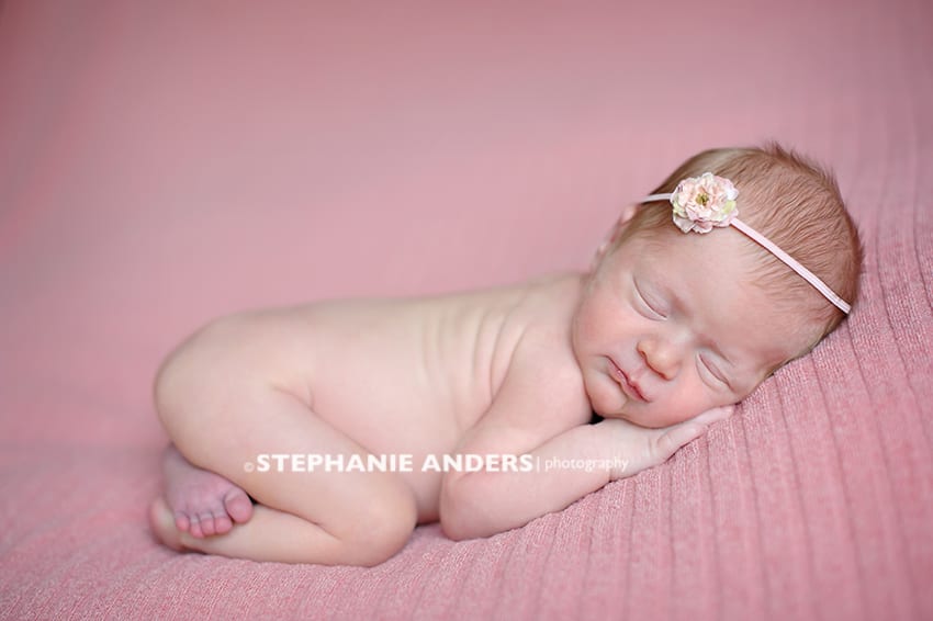newborn photo baby girl pink blanket