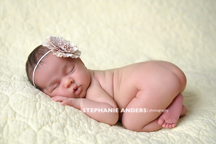 newborn photography miami girl yellow blanket