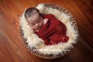 newborn photography miami girl red blanket basket
