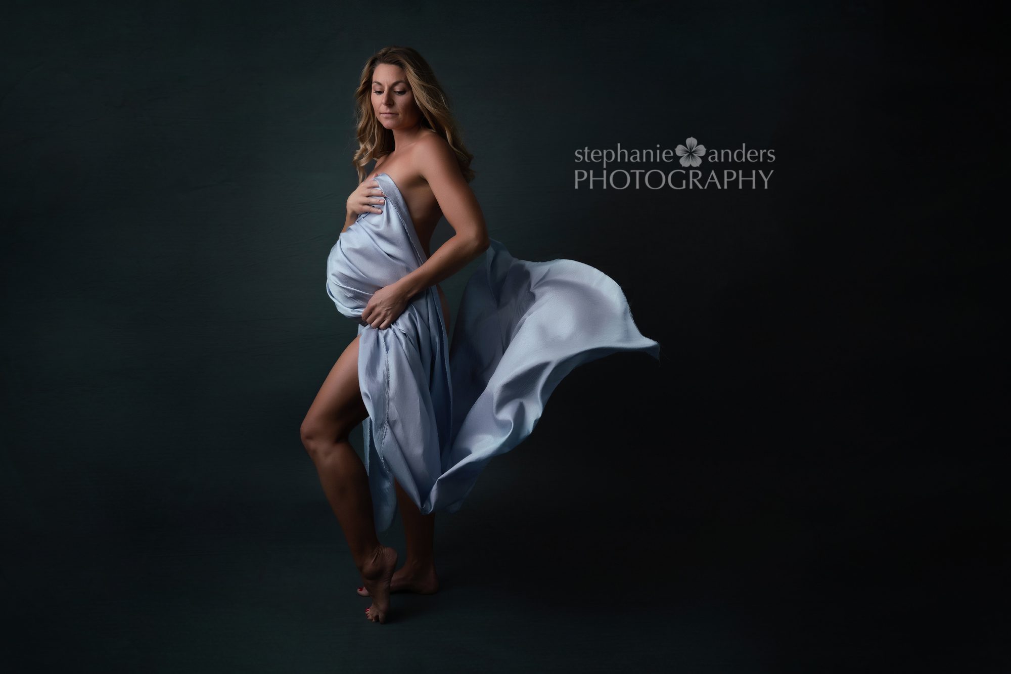 Maternity Pictures with grey fabric toss