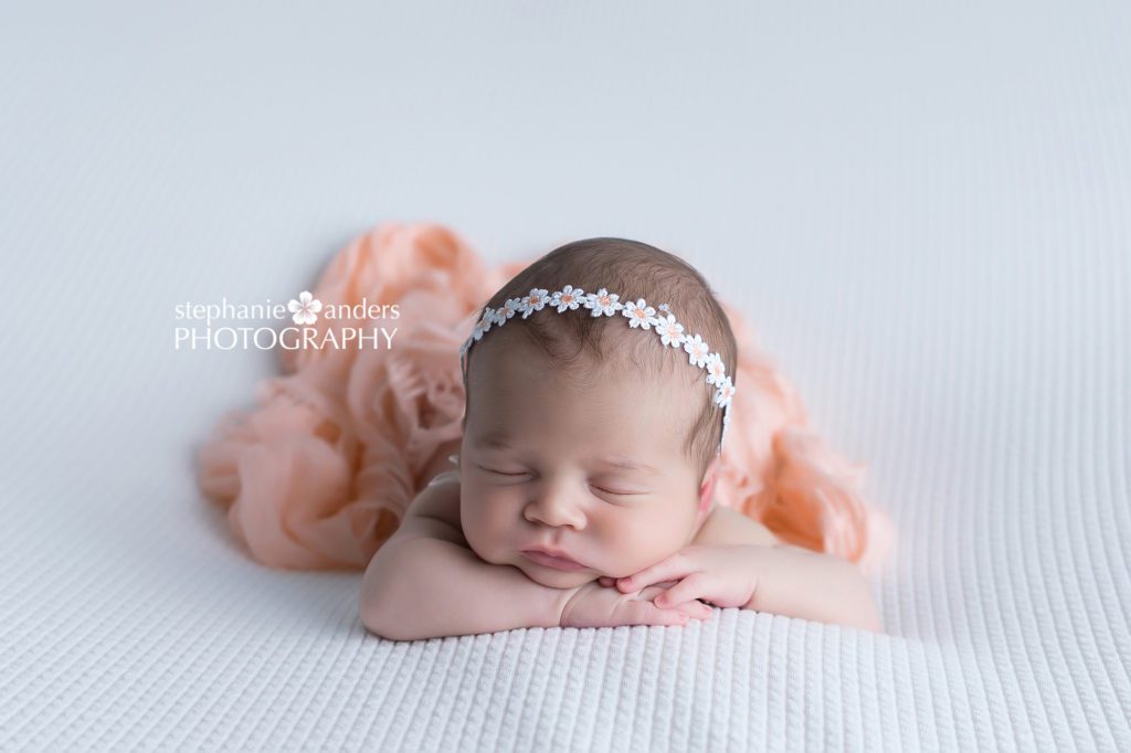  baby girl on peach blanket
Best newborn photographer