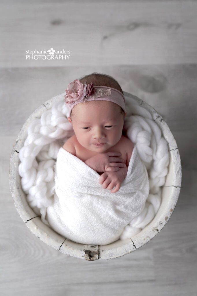 Newborn baby photo in pink