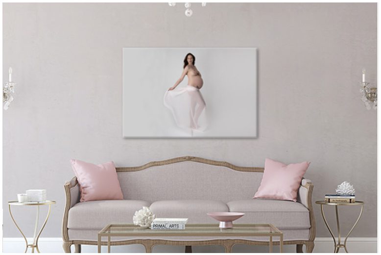 A photo of a pregnant woman in a living room.